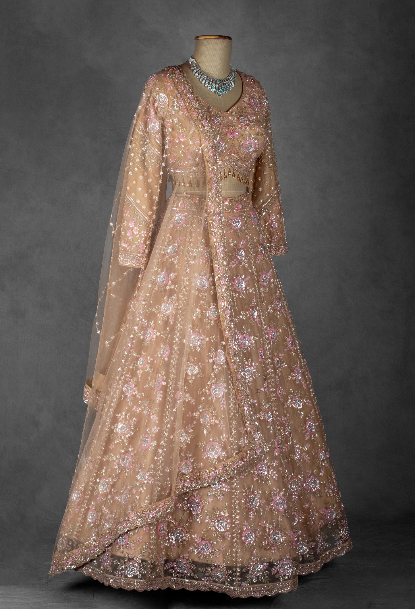 Blush Peach Floral Embroidered Crop Top Lehenga Set in Net with Sequin & Thread Work