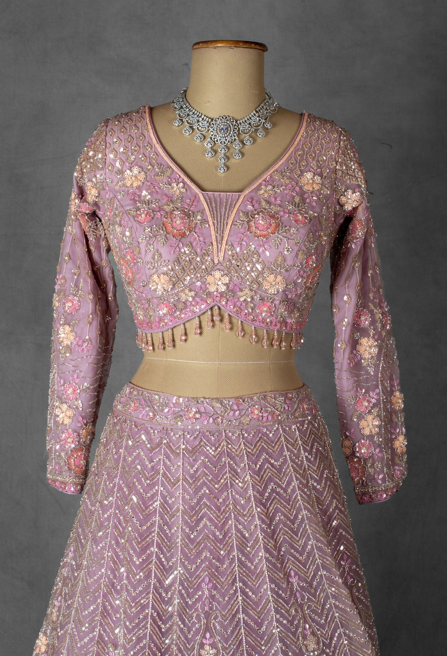 Dusty Mauve Embroidered Crop Top Lehenga with Floral Detailing & Net Dupatta –