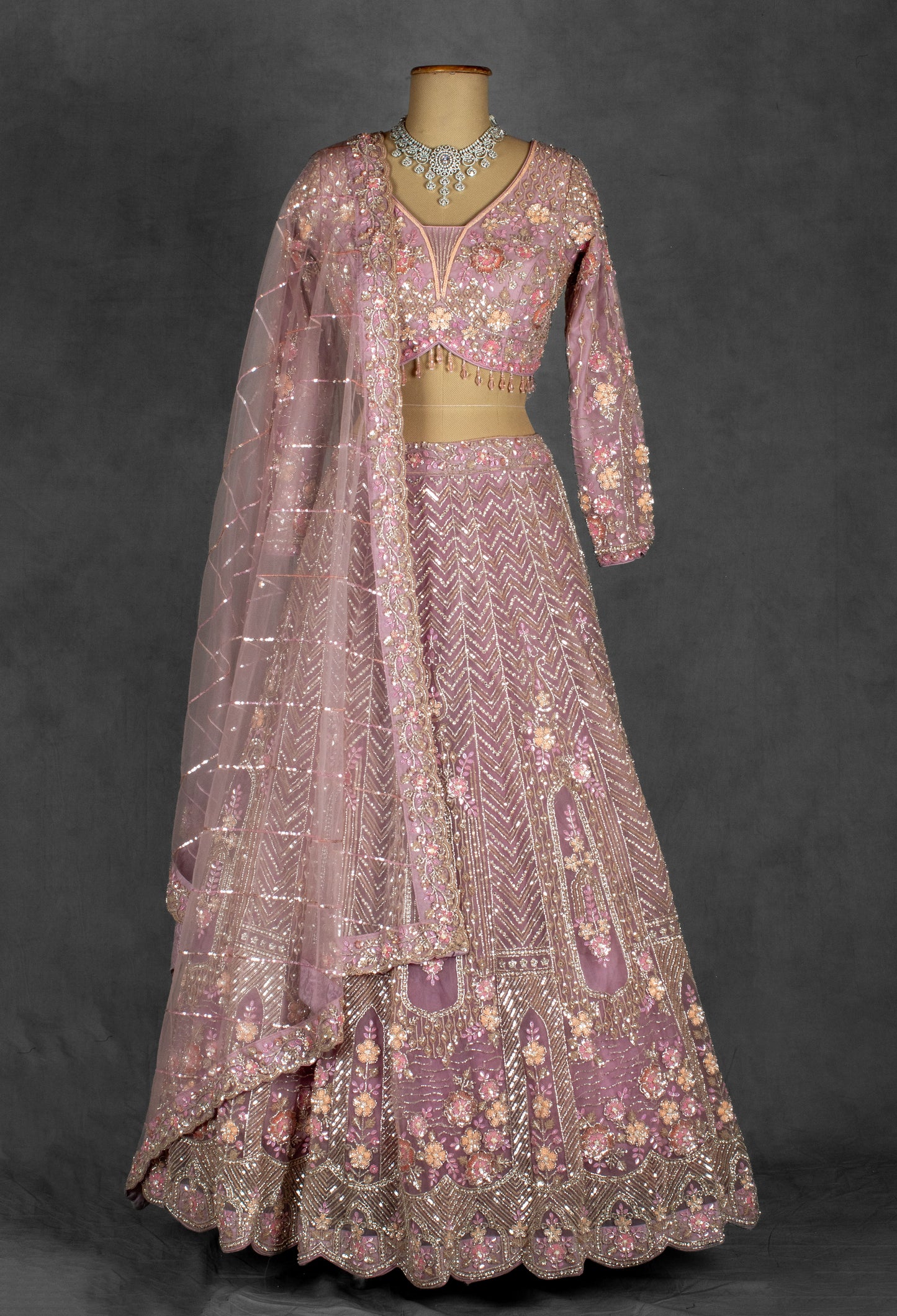 Dusty Mauve Embroidered Crop Top Lehenga with Floral Detailing & Net Dupatta –
