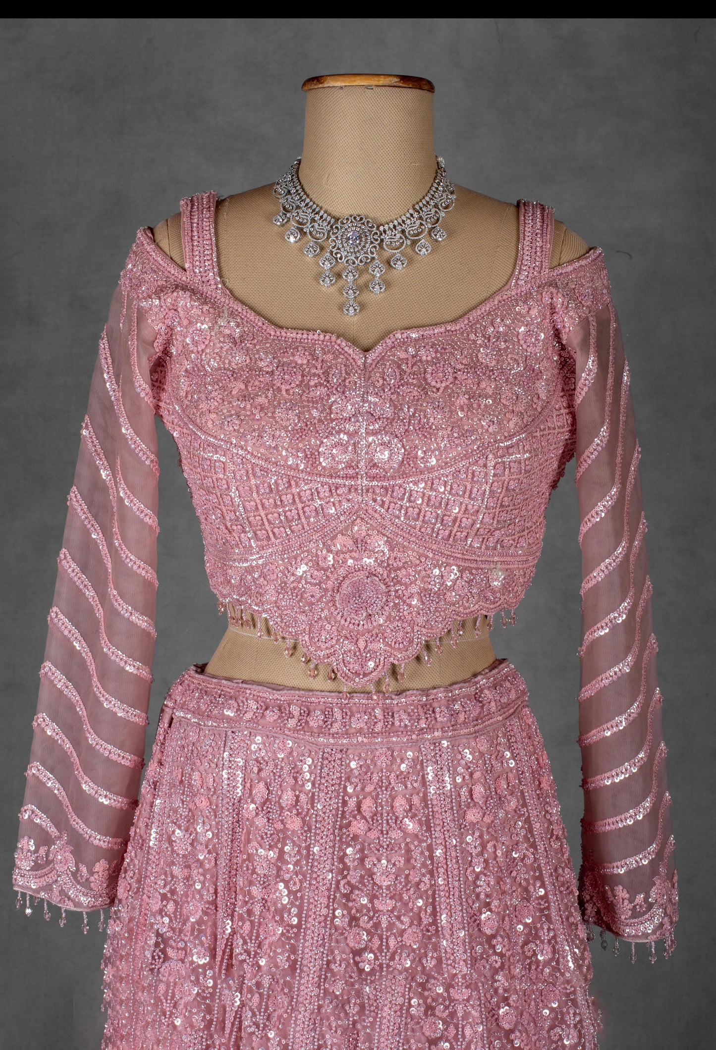 Rose Pink Heavy Embroidered Lehenga with Cold-Shoulder Crop Top & Net Dupatta