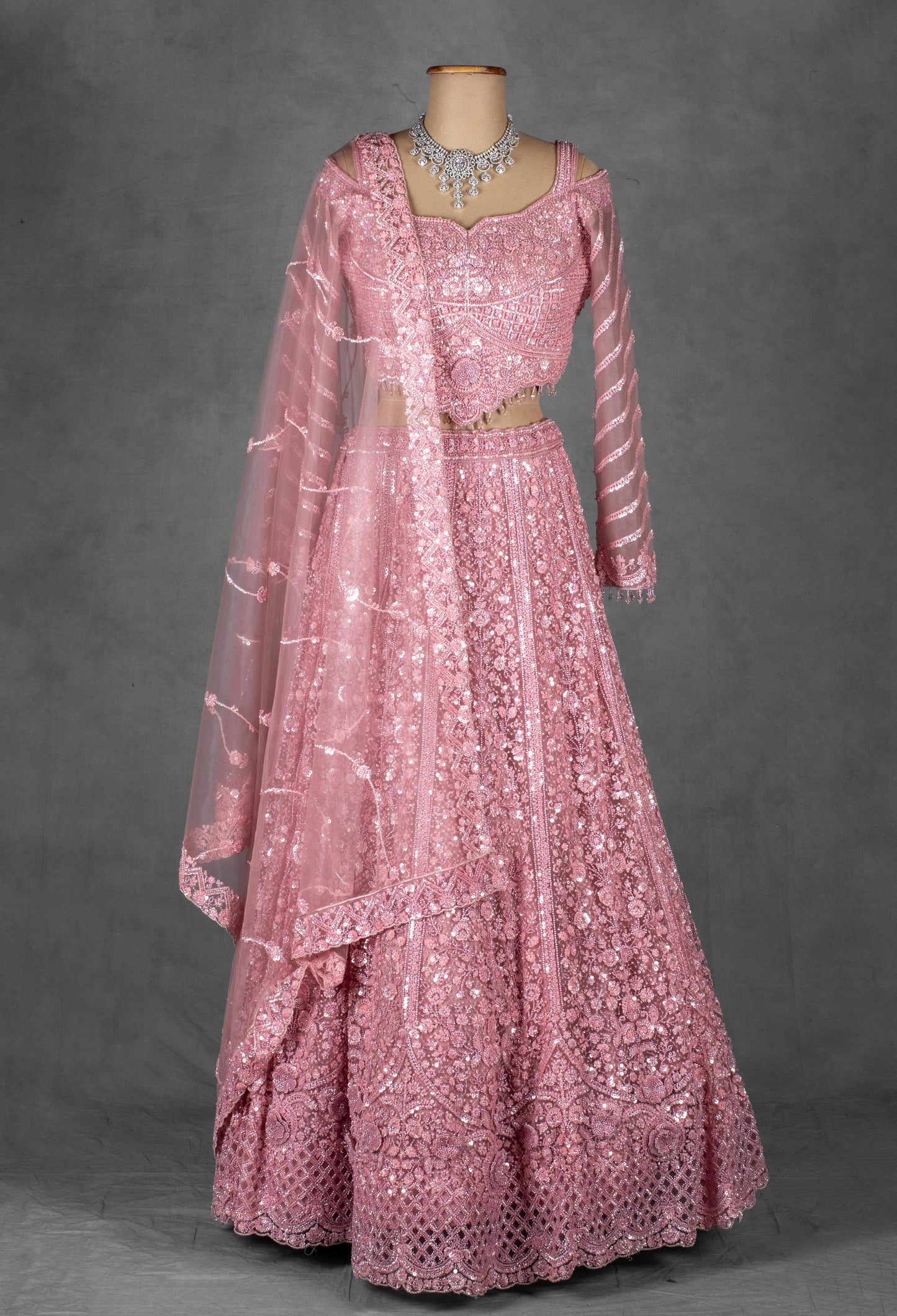 Rose Pink Heavy Embroidered Lehenga with Cold-Shoulder Crop Top & Net Dupatta