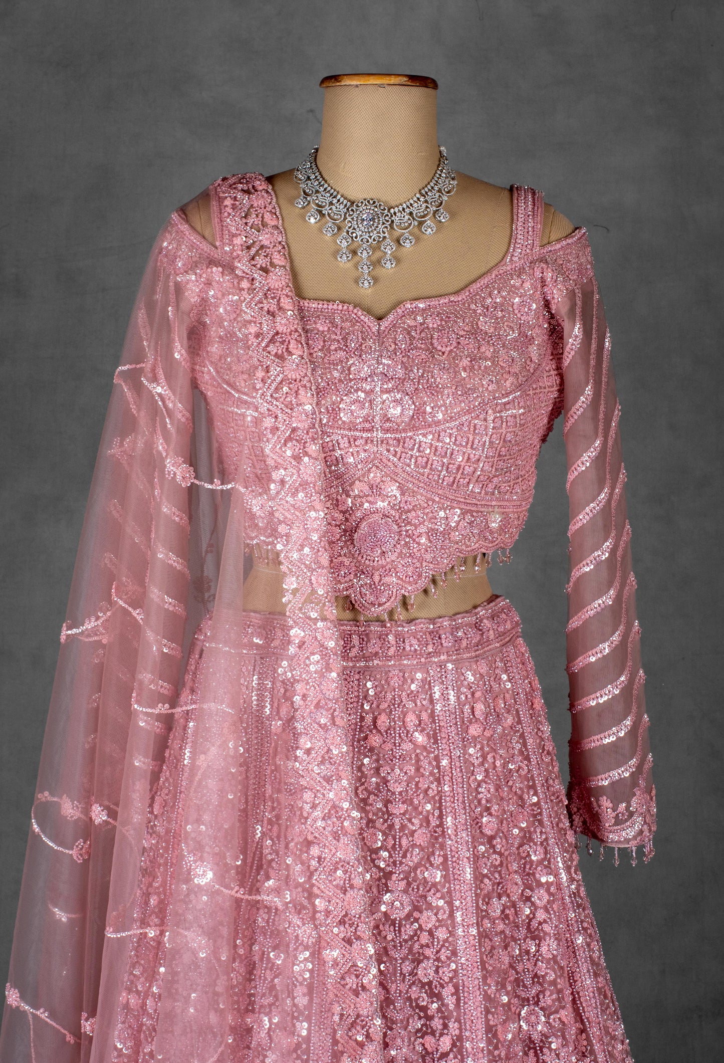 Rose Pink Heavy Embroidered Lehenga with Cold-Shoulder Crop Top & Net Dupatta