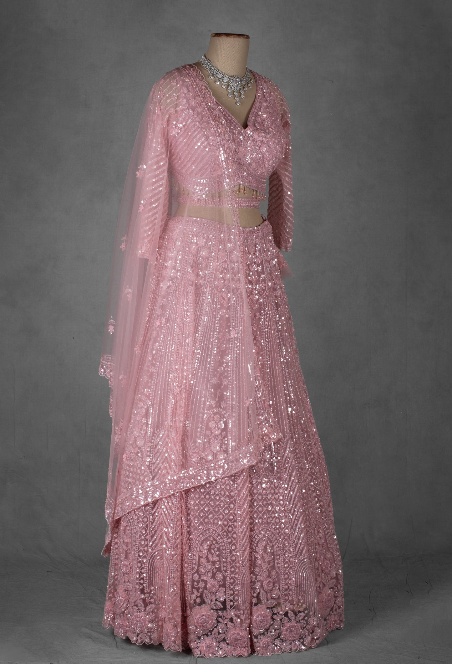 Pastel Pink Embroidered Crop Top Lehenga with Net Dupatta