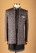 Black Indo-Western Sherwani with Silver Embroidery & Metallic Buttons – Designer Groom & Party Wear for Men