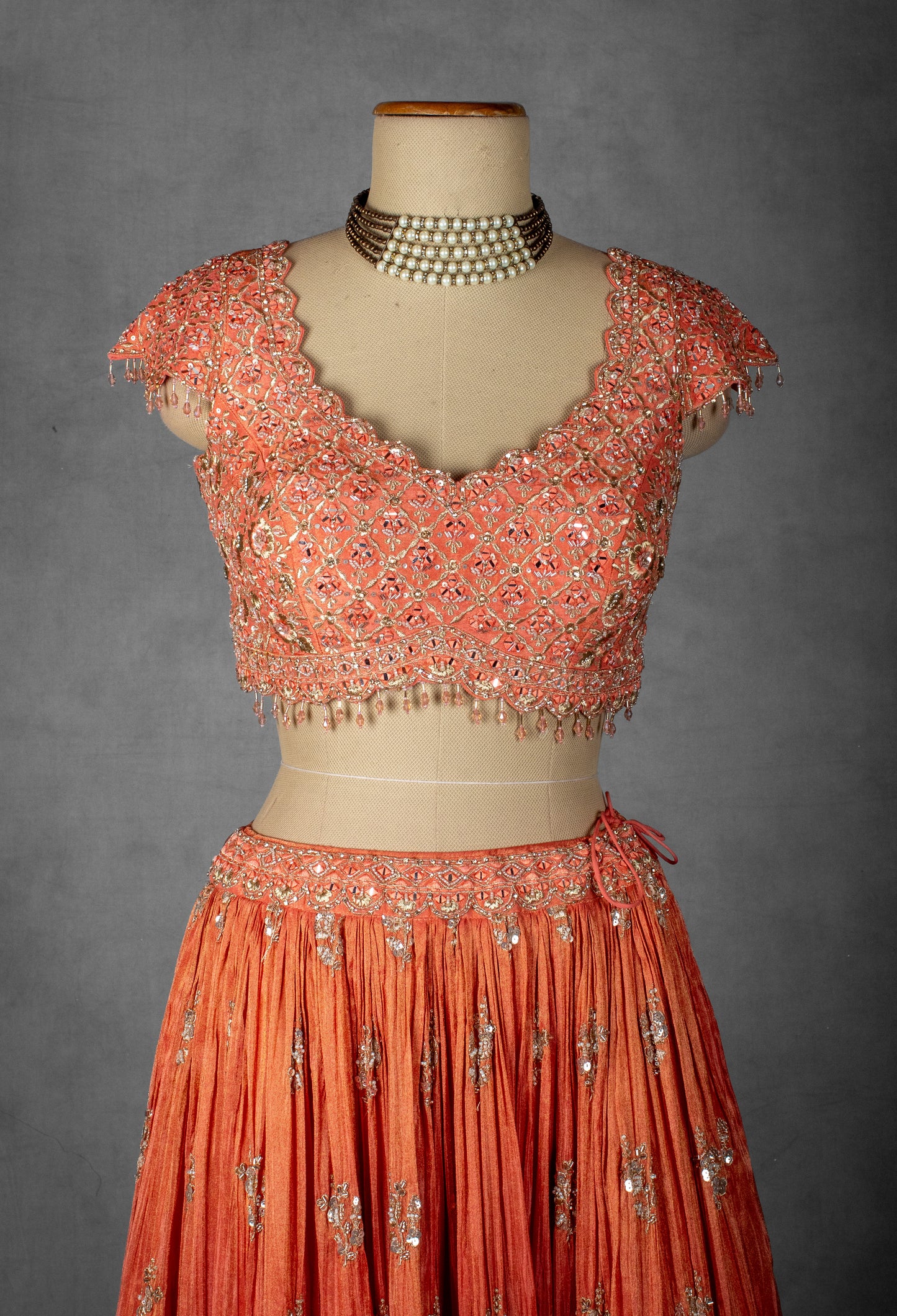 Embellished Coral Peach Lehenga Set with Handcrafted Floral Work