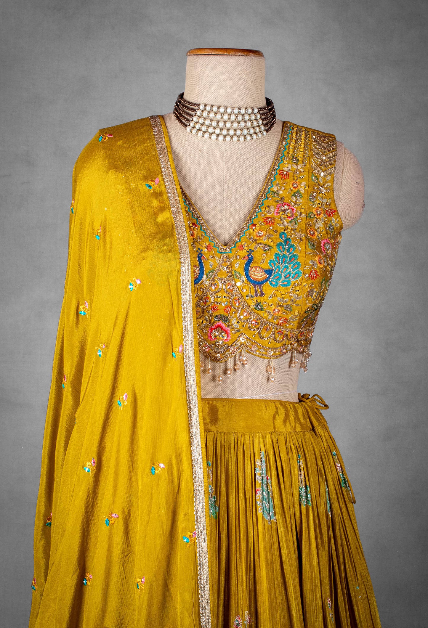 Mustard Yellow Hand-Embroidered Lehenga Set with Multicolor Thread and Zari Work