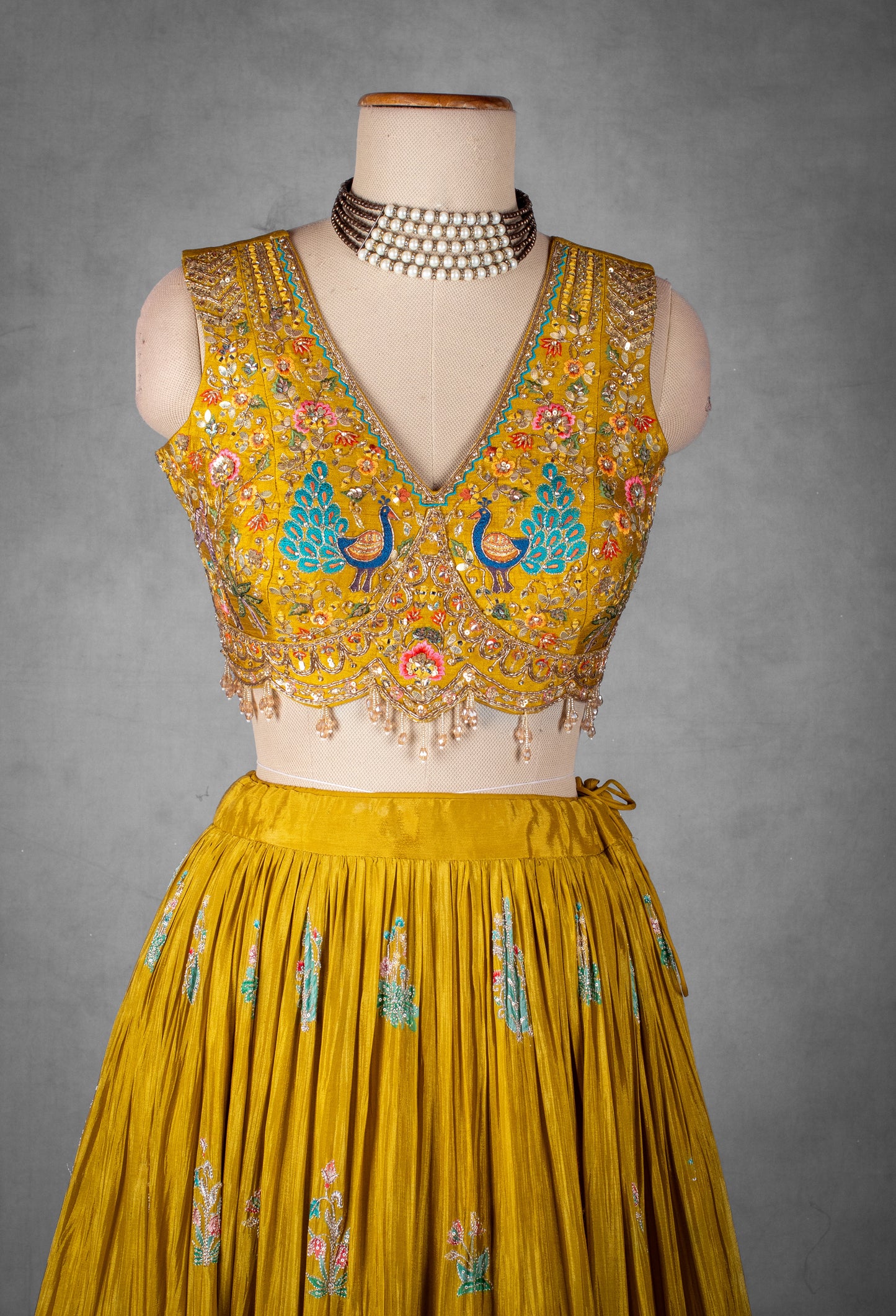 Mustard Yellow Hand-Embroidered Lehenga Set with Multicolor Thread and Zari Work