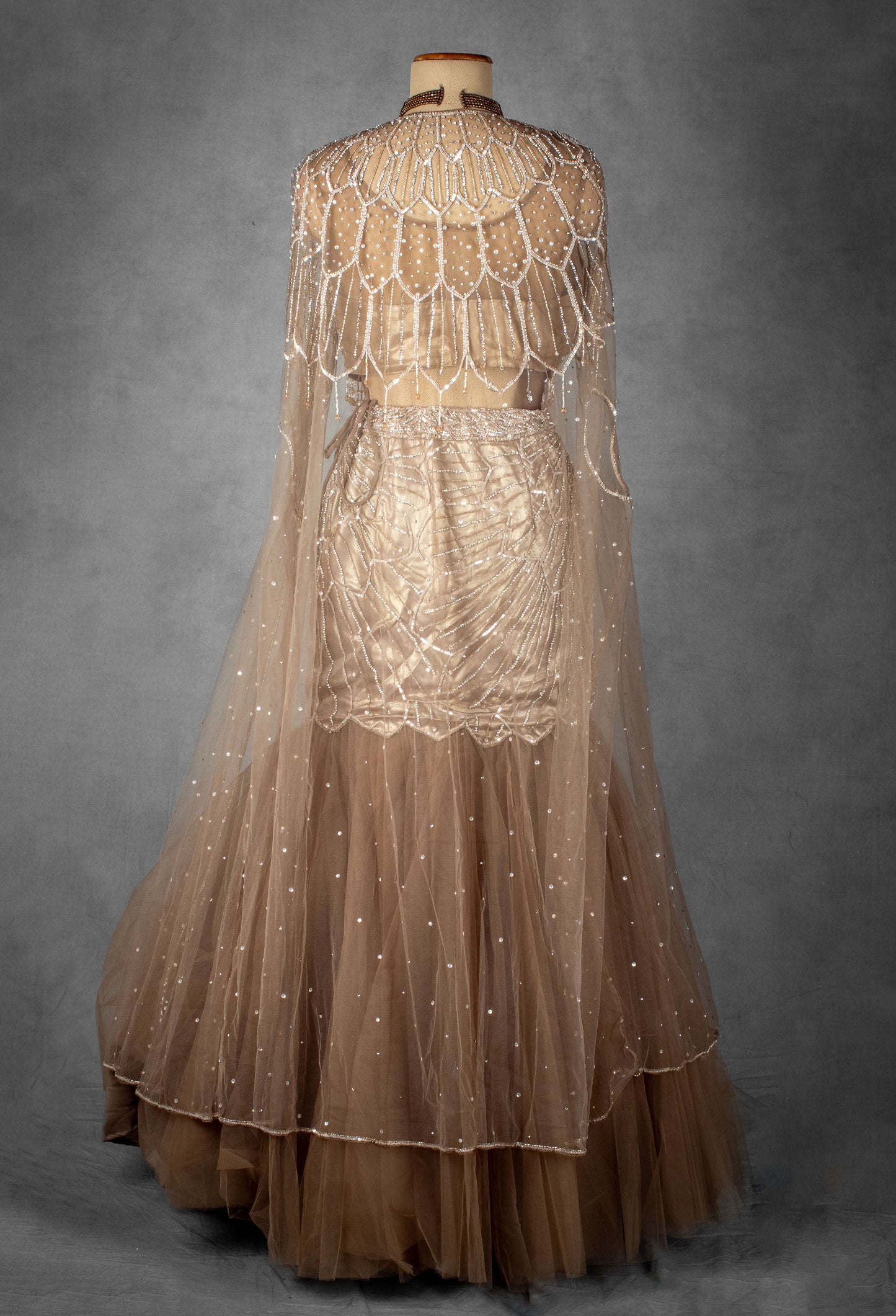 Champagne Gold Embellished Mermaid Lehenga Set with Sheer Cape Dupatta