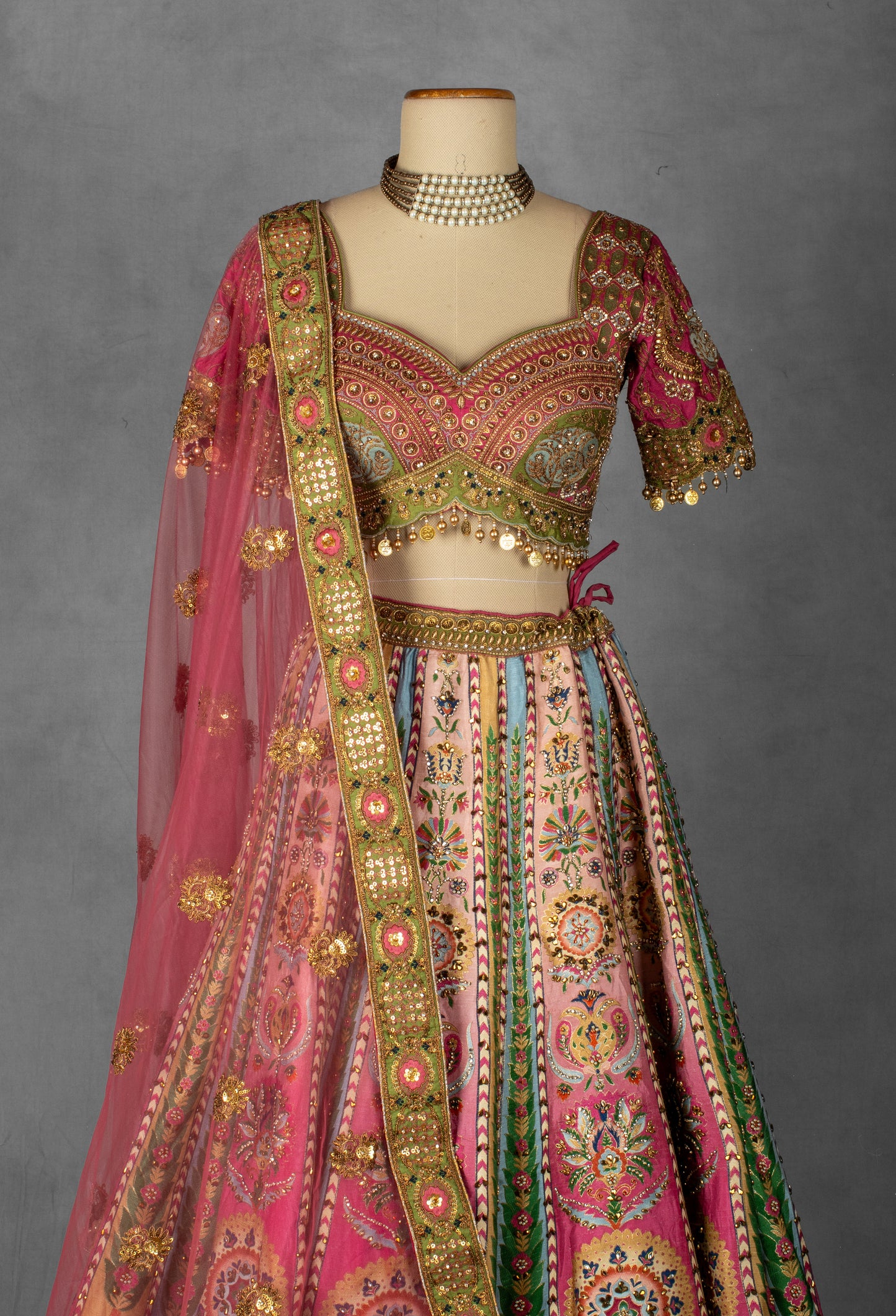 Multicolor Mirror and Thread Embroidered Silk Lehenga with Gota Patti Detailing