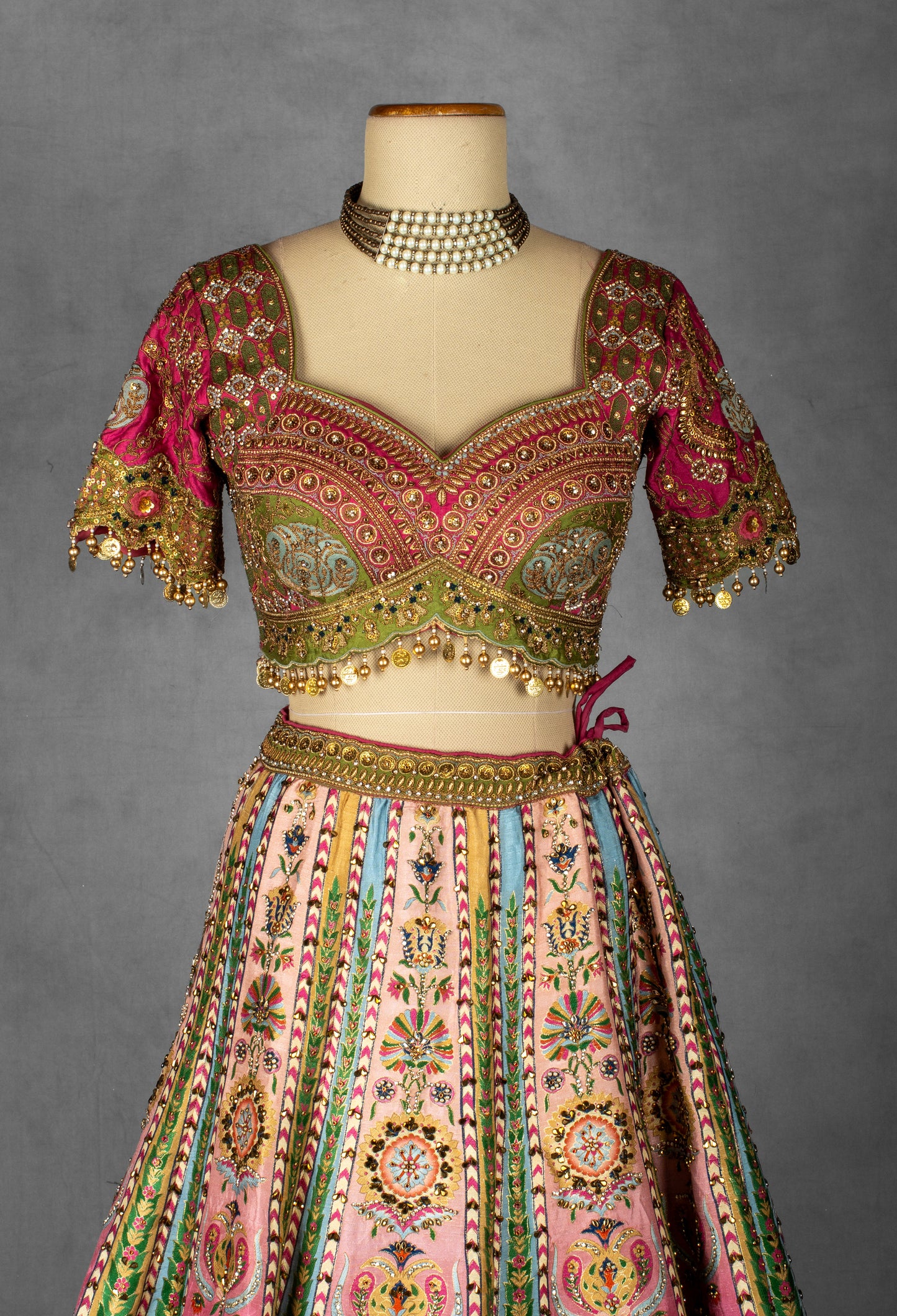 Multicolor Mirror and Thread Embroidered Silk Lehenga with Gota Patti Detailing