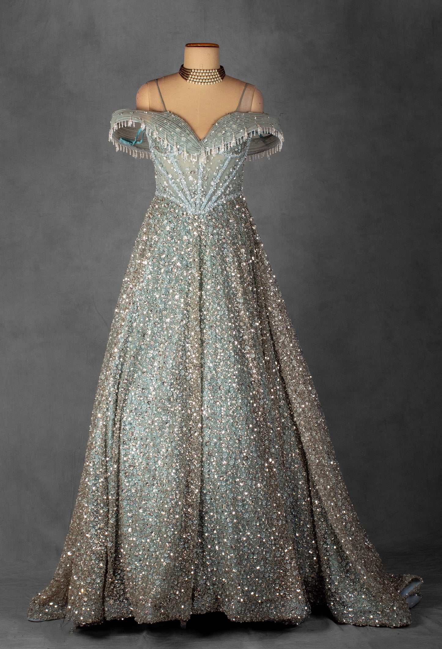 ice Blue Off-Shoulder Crystal Embellished Ball Gown with Beaded Draped Bodice