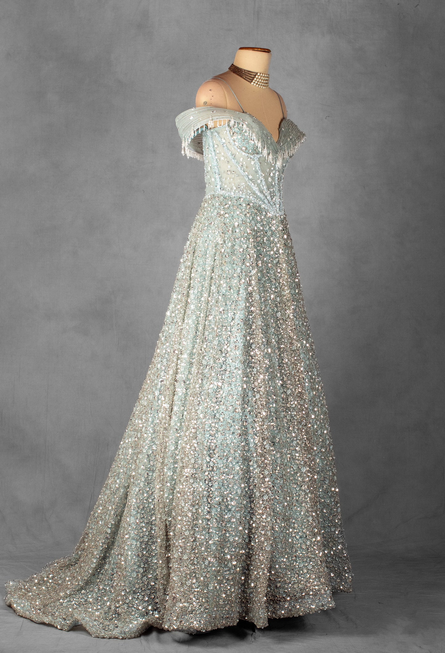 ice Blue Off-Shoulder Crystal Embellished Ball Gown with Beaded Draped Bodice