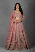 Dusty Rose Hand-Embroidered Bridal Lehenga with Peacock Motifs and Sequin Detailing
