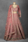 Dusty Rose Hand-Embroidered Bridal Lehenga with Peacock Motifs and Sequin Detailing