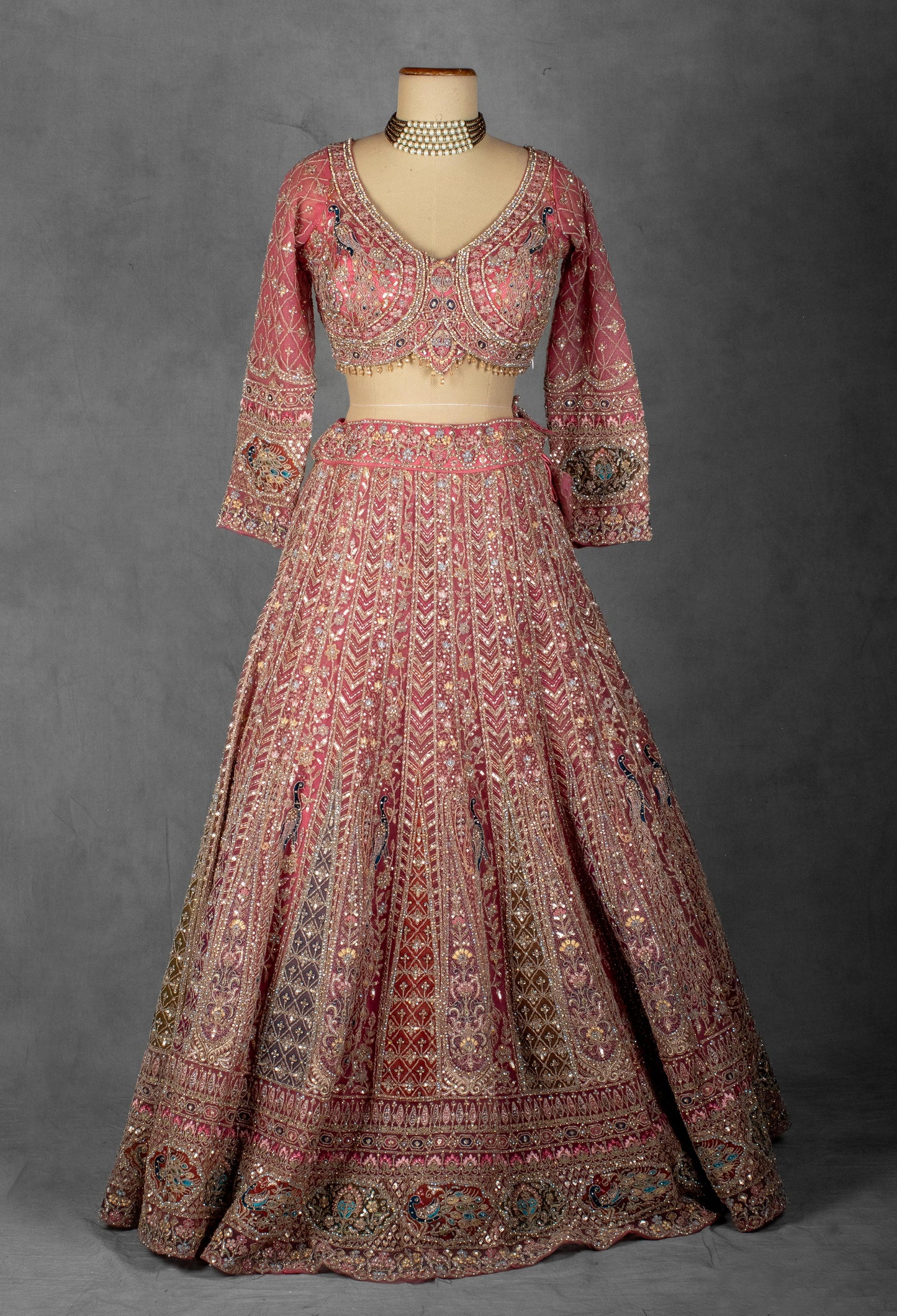 Dusty Rose Hand-Embroidered Bridal Lehenga with Peacock Motifs and Sequin Detailing