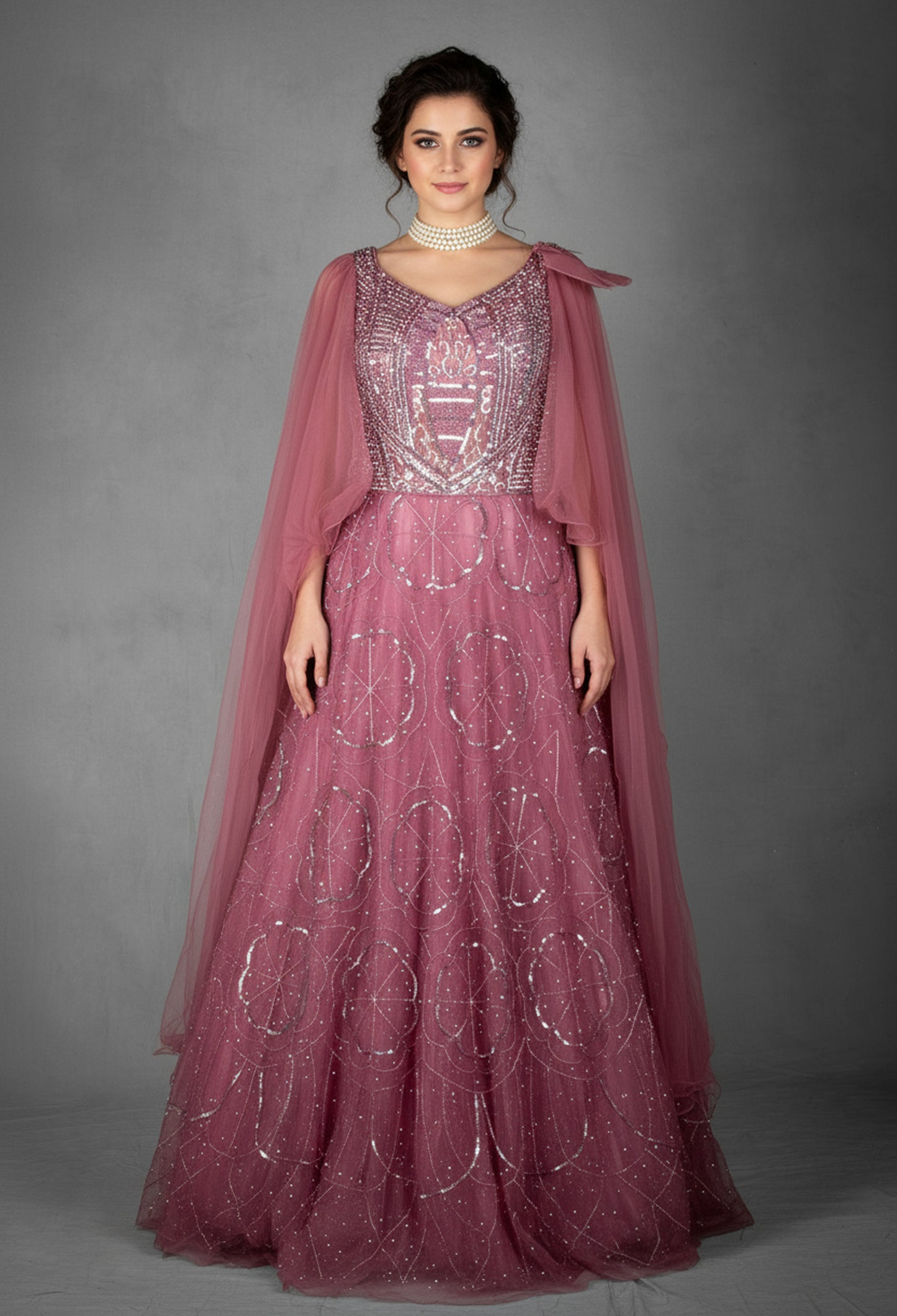 Mauve Sequined Gown with Ruffled Cape Sleeves and Hand-Embroidered Bodice