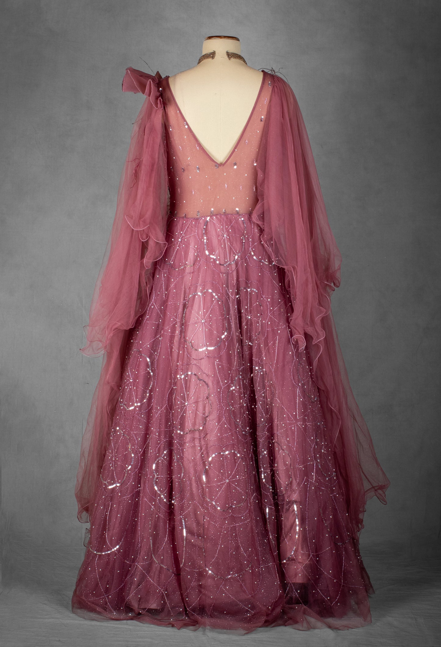 Mauve Sequined Gown with Ruffled Cape Sleeves and Hand-Embroidered Bodice