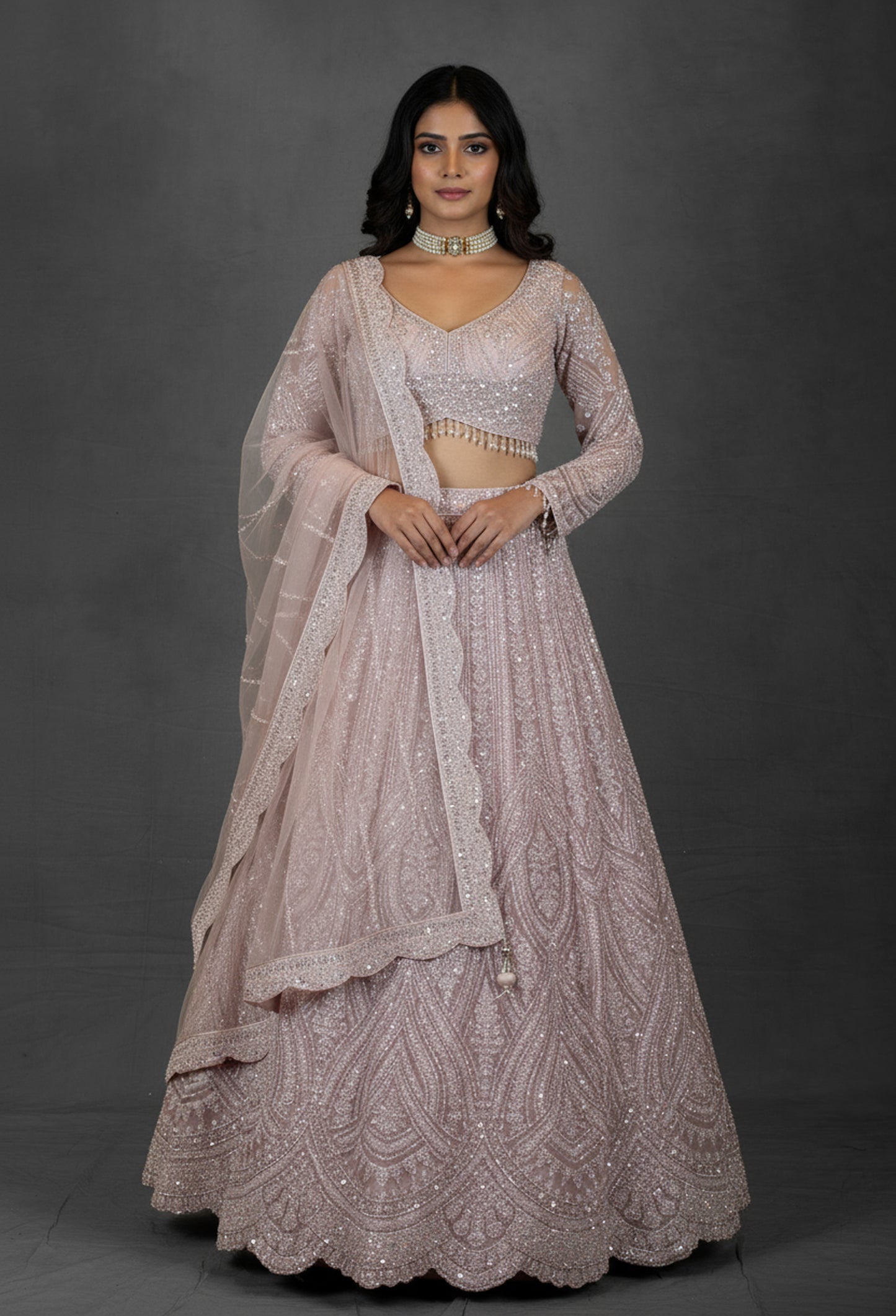 Blush Pink Sequin Embroidered Lehenga with Full-Sleeve Blouse and Net Dupatta