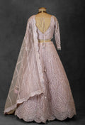 Blush Pink Sequin Embroidered Lehenga with Full-Sleeve Blouse and Net Dupatta