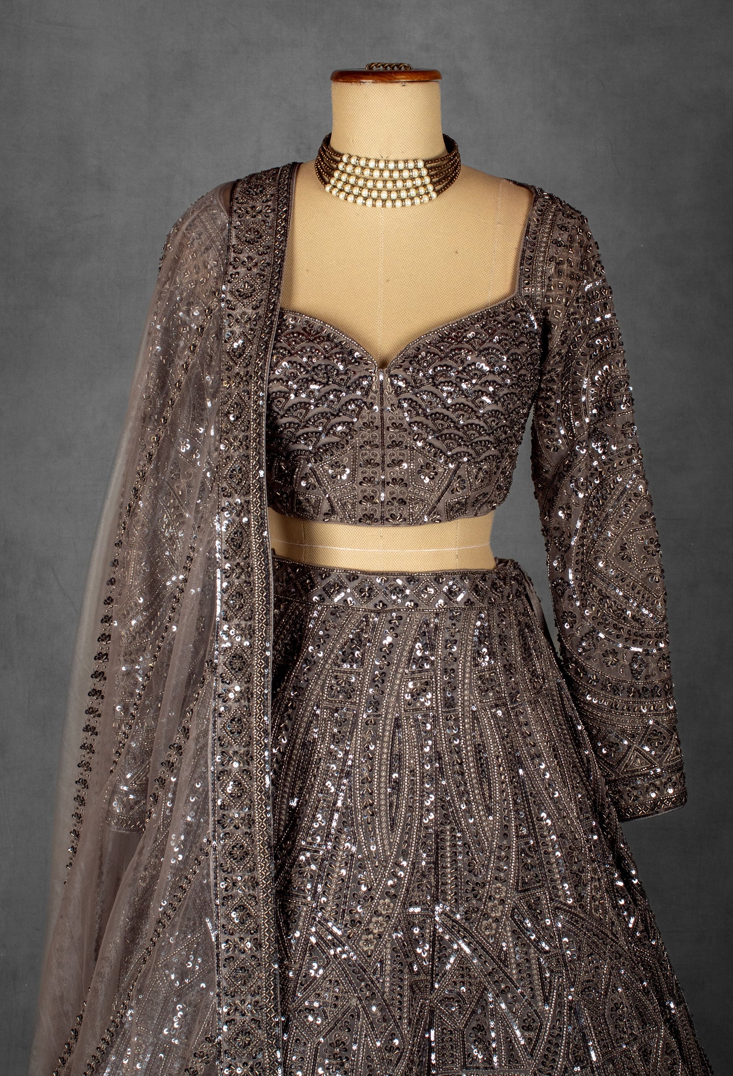 Smoky Brown Sequin Embellished Lehenga with Intricate Geometric Detailing