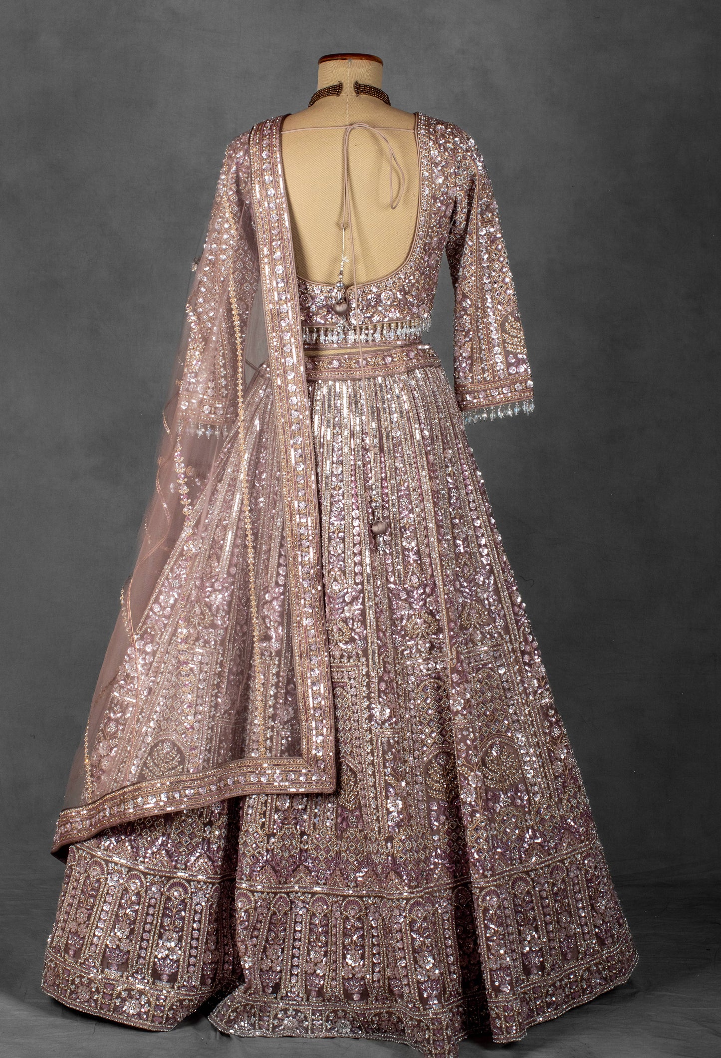 Mauve Rose Sequin Embroidered Lehenga with Full-Sleeve Blouse and Net Dupatta