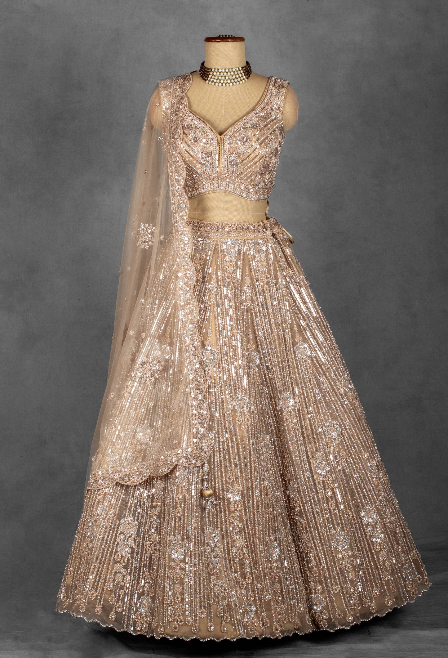 Champagne Gold Sequin Embroidered Lehenga with Structured Blouse and Net Dupatta
