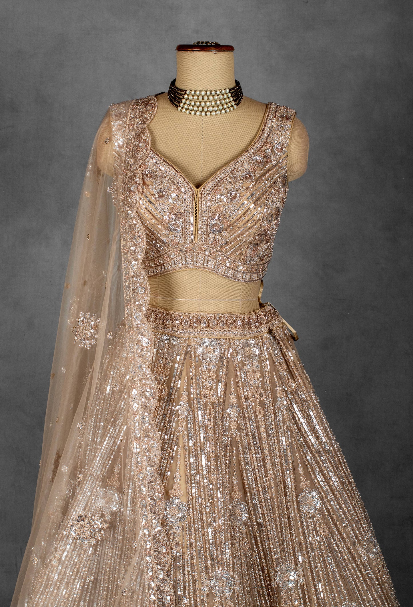Champagne Gold Sequin Embroidered Lehenga with Structured Blouse and Net Dupatta