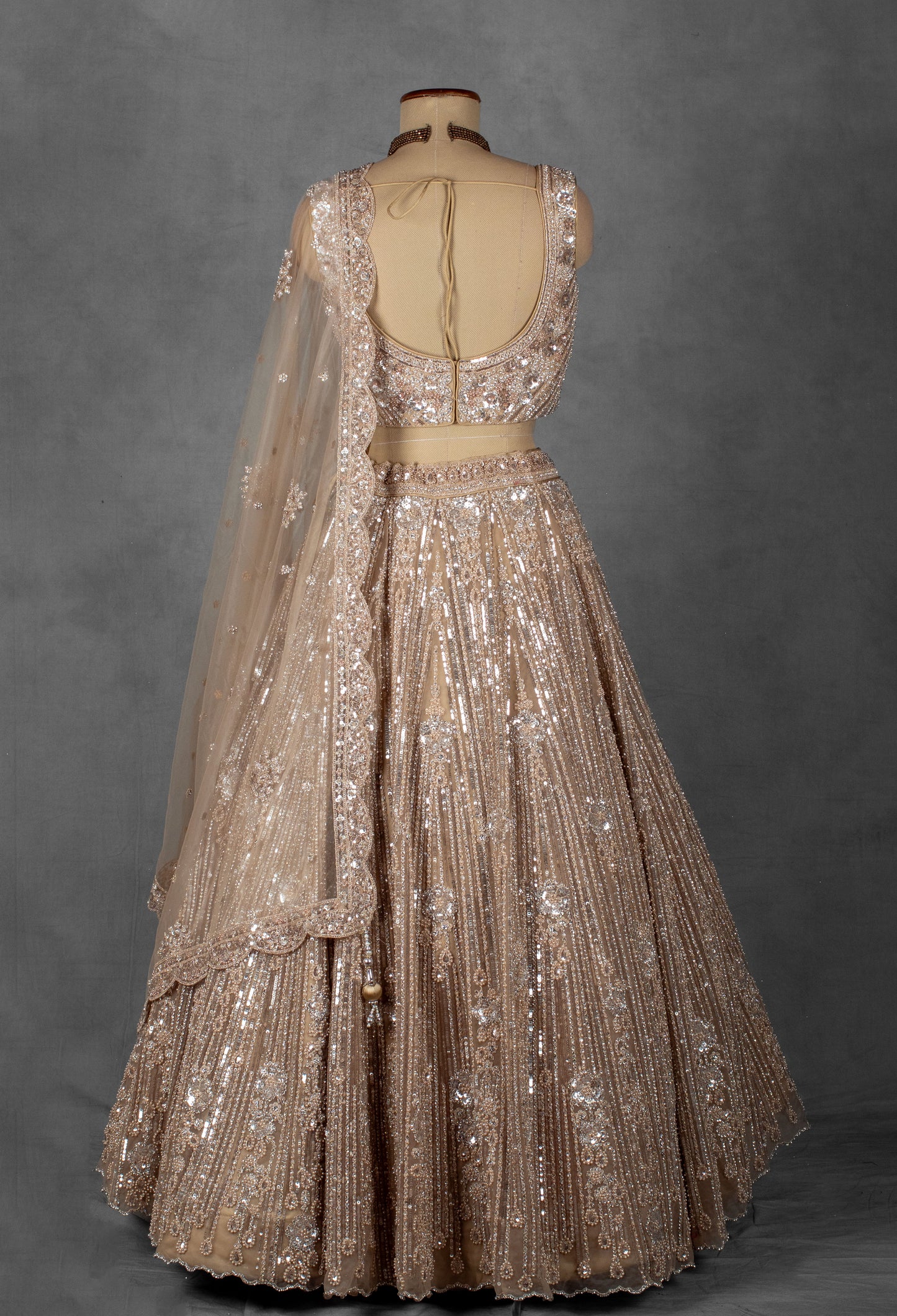 Champagne Gold Sequin Embroidered Lehenga with Structured Blouse and Net Dupatta