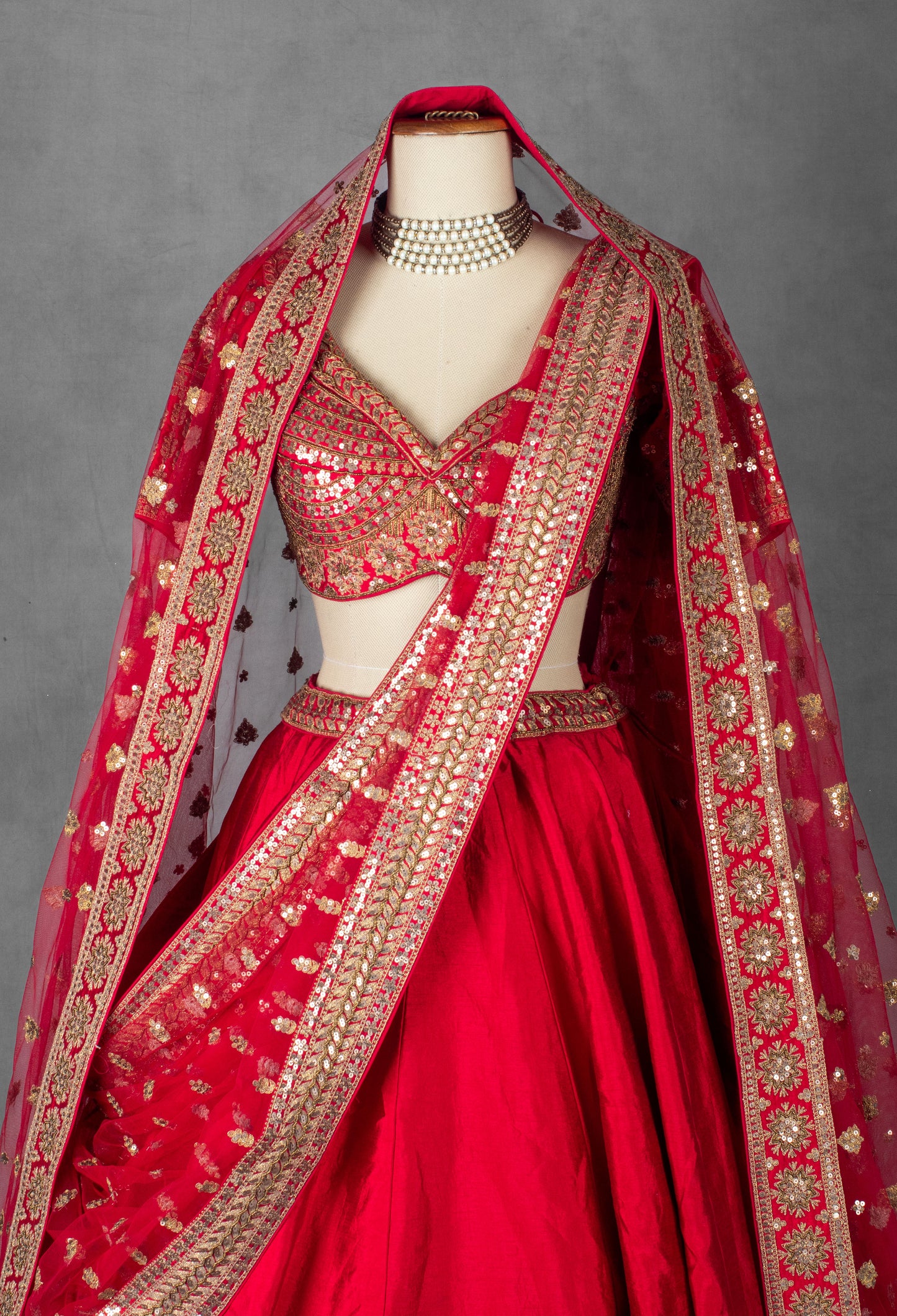 Regal Red Raw Silk Bridal Lehenga with Handcrafted Zardosi & Mirror Embroidery