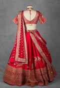 Regal Red Raw Silk Bridal Lehenga with Handcrafted Zardosi & Mirror Embroidery