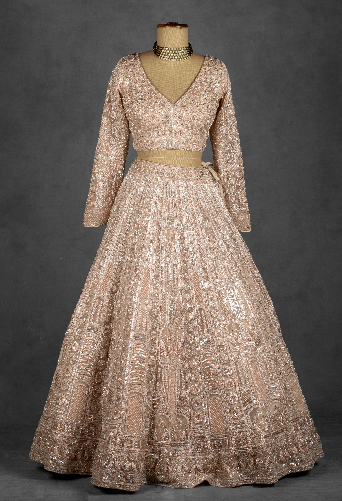 Champagne Nude Heavily Embroidered Sequin Lehenga with Full-Sleeve Blouse and Net Dupatta