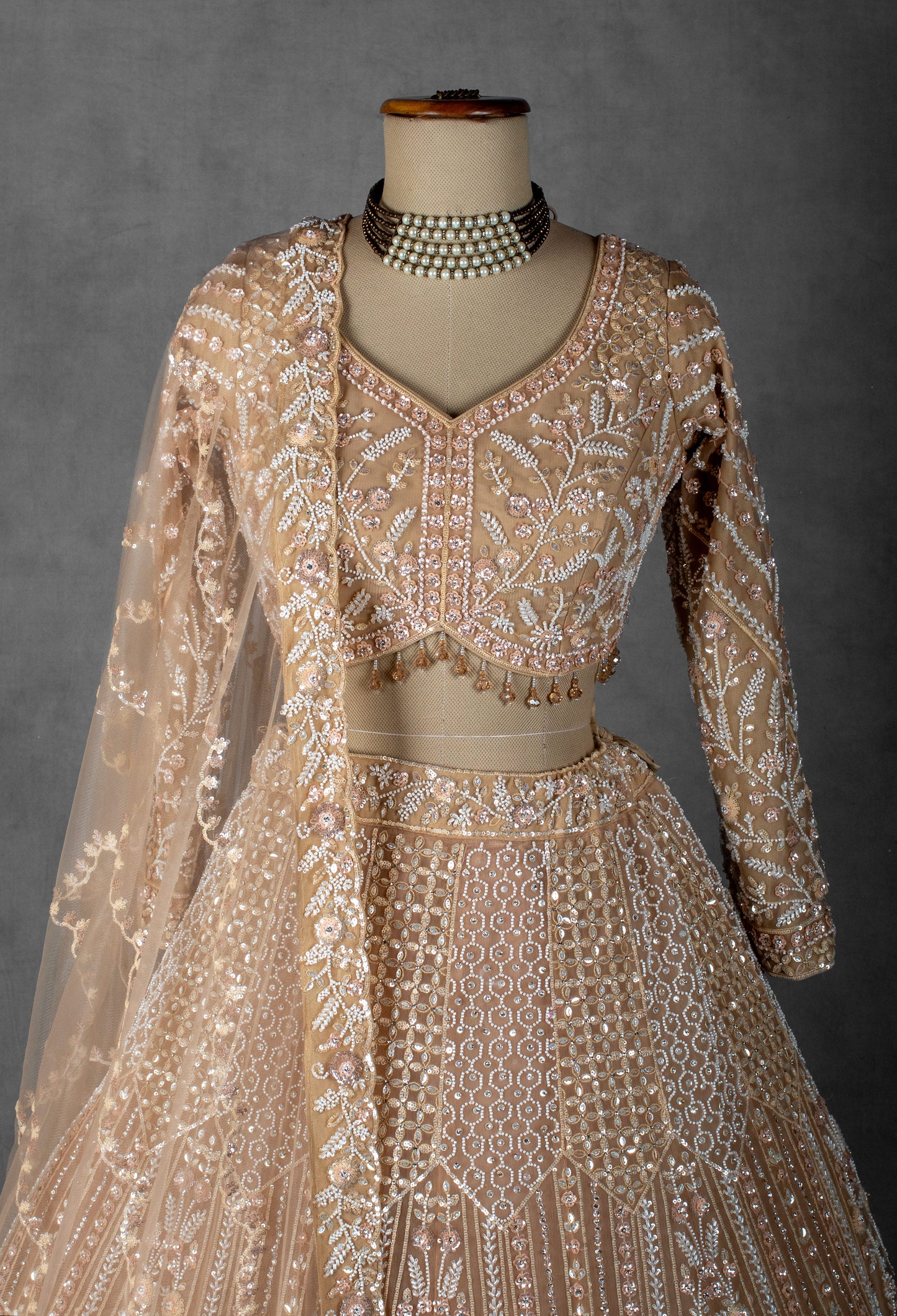 Golden Beige Hand-Embroidered Sequin and Pearl Lehenga with Full-Sleeve Blouse and Net Dupatta