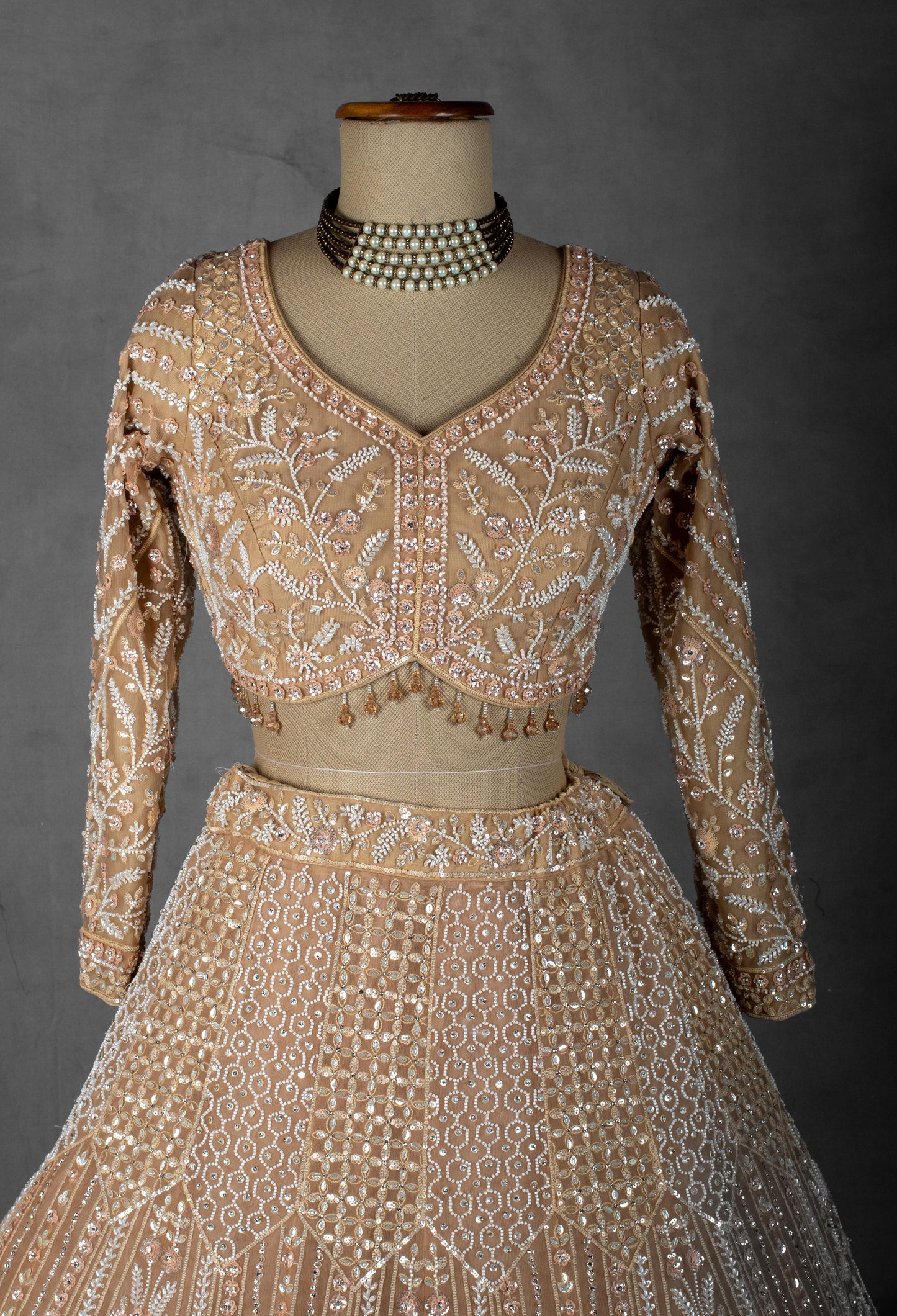 Golden Beige Hand-Embroidered Sequin and Pearl Lehenga with Full-Sleeve Blouse and Net Dupatta