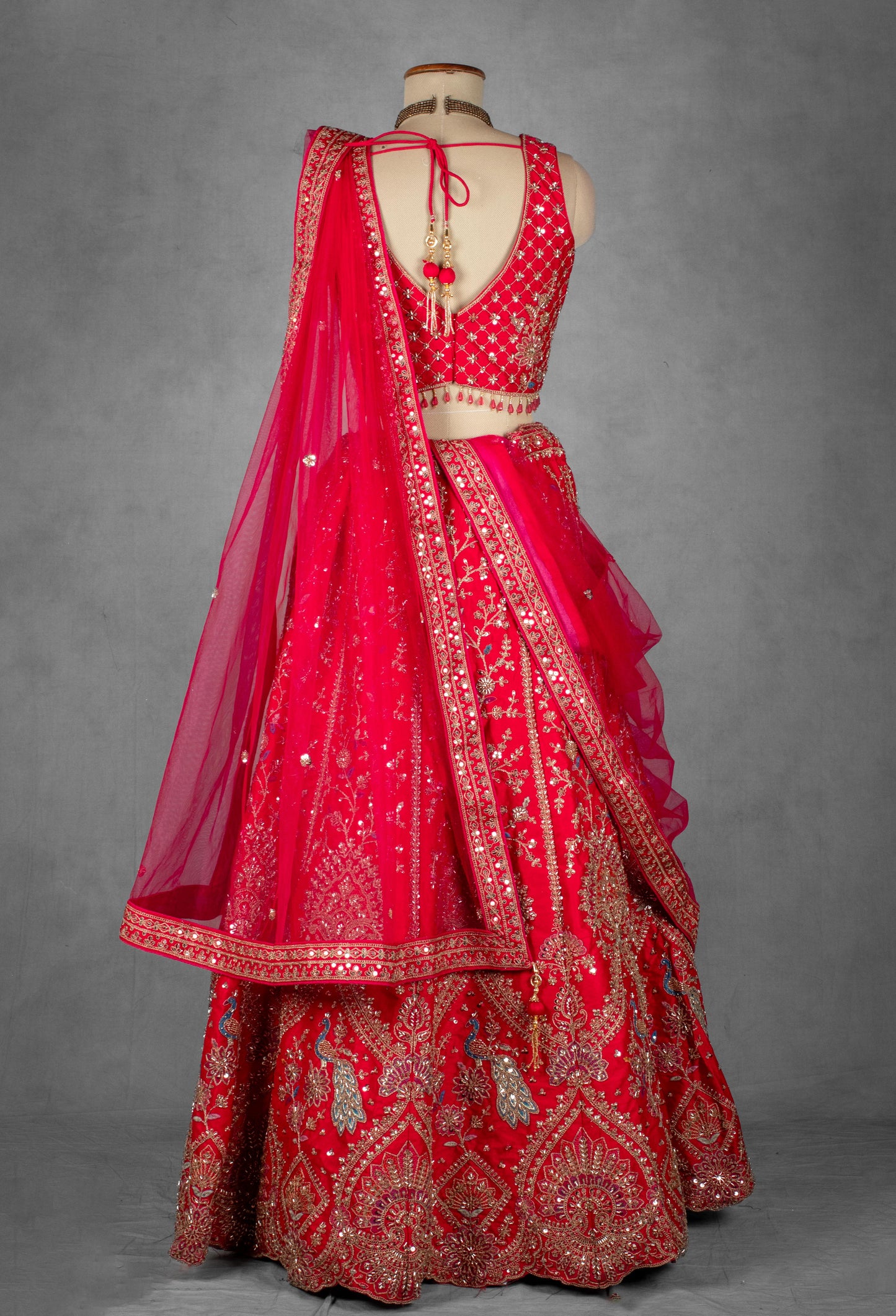 Red Embroidered Bridal Lehenga with Golden Zardosi and Threadwork
