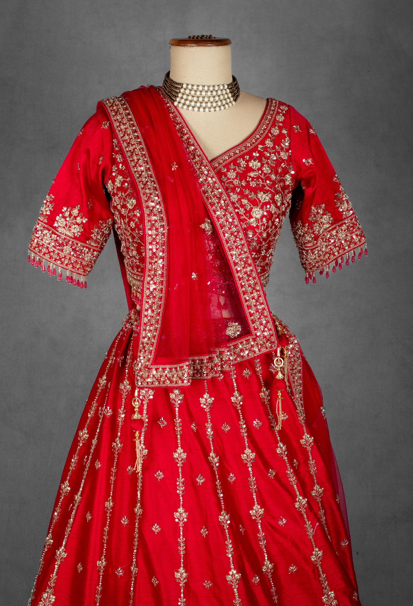 Classic Red Hand-Embroidered Bridal Lehenga with Zardosi and Sequin Detailing