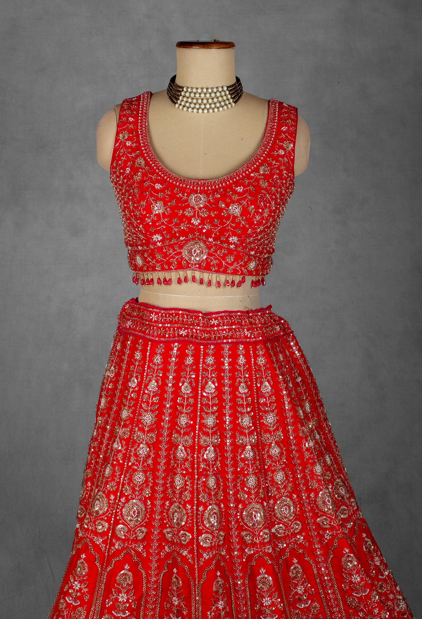 Traditional Red Handcrafted Bridal Lehenga with Intricate Zardosi and Sequin Embroidery