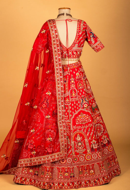 Red heritage embroidered bridal lehenga with royal motifs – product image 2