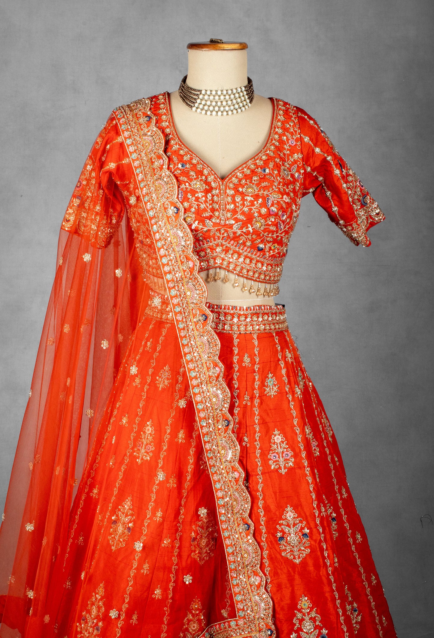 Orange-Red Embroidered Bridal Crop Top Lehenga Set with Net Dupatta