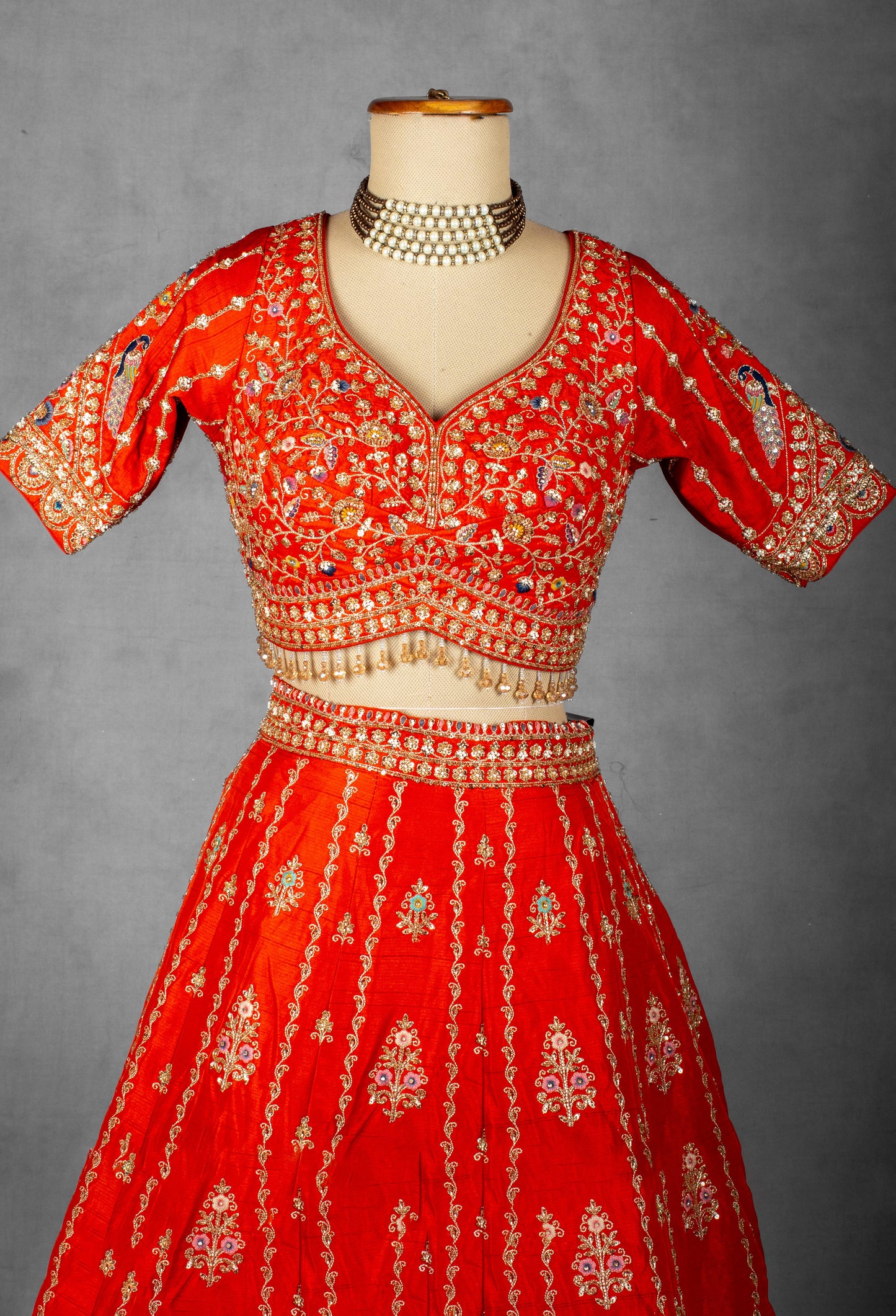 Orange-Red Embroidered Bridal Crop Top Lehenga Set with Net Dupatta