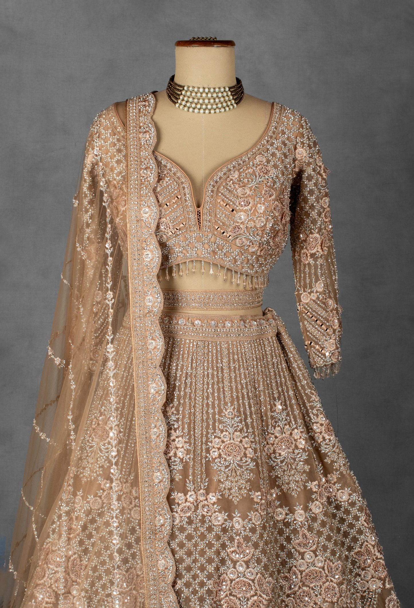 Champagne Nude Hand-Embroidered Crop Top Lehenga Set with Net Dupatta