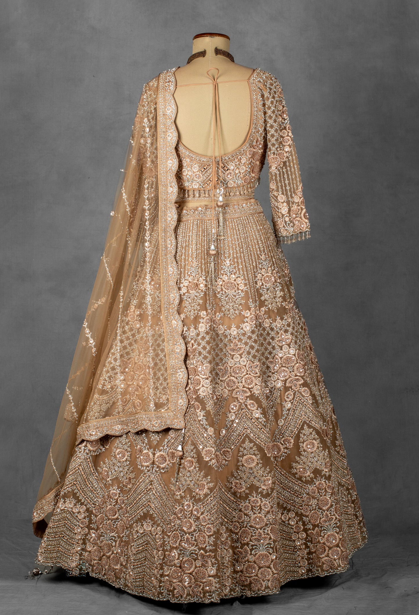 Champagne Nude Hand-Embroidered Crop Top Lehenga Set with Net Dupatta