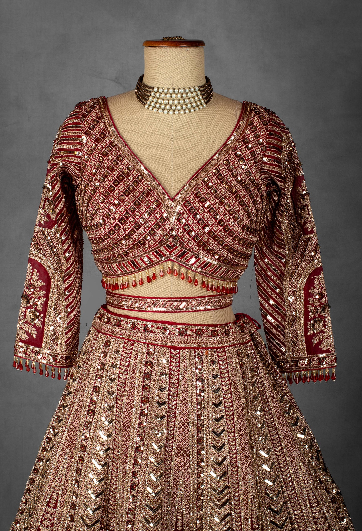 Deep Red Hand-Embroidered Bridal Crop Top Lehenga Set with Net Dupatta