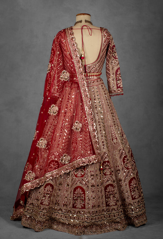 Deep red hand-embroidered bridal lehenga with net dupatta – product image 2