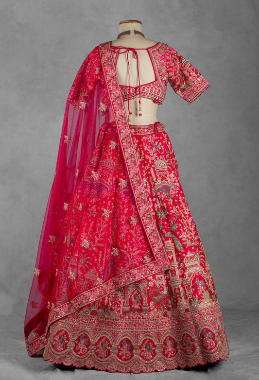 Bright pink heritage embroidered bridal lehenga set with net dupatta – product image 2