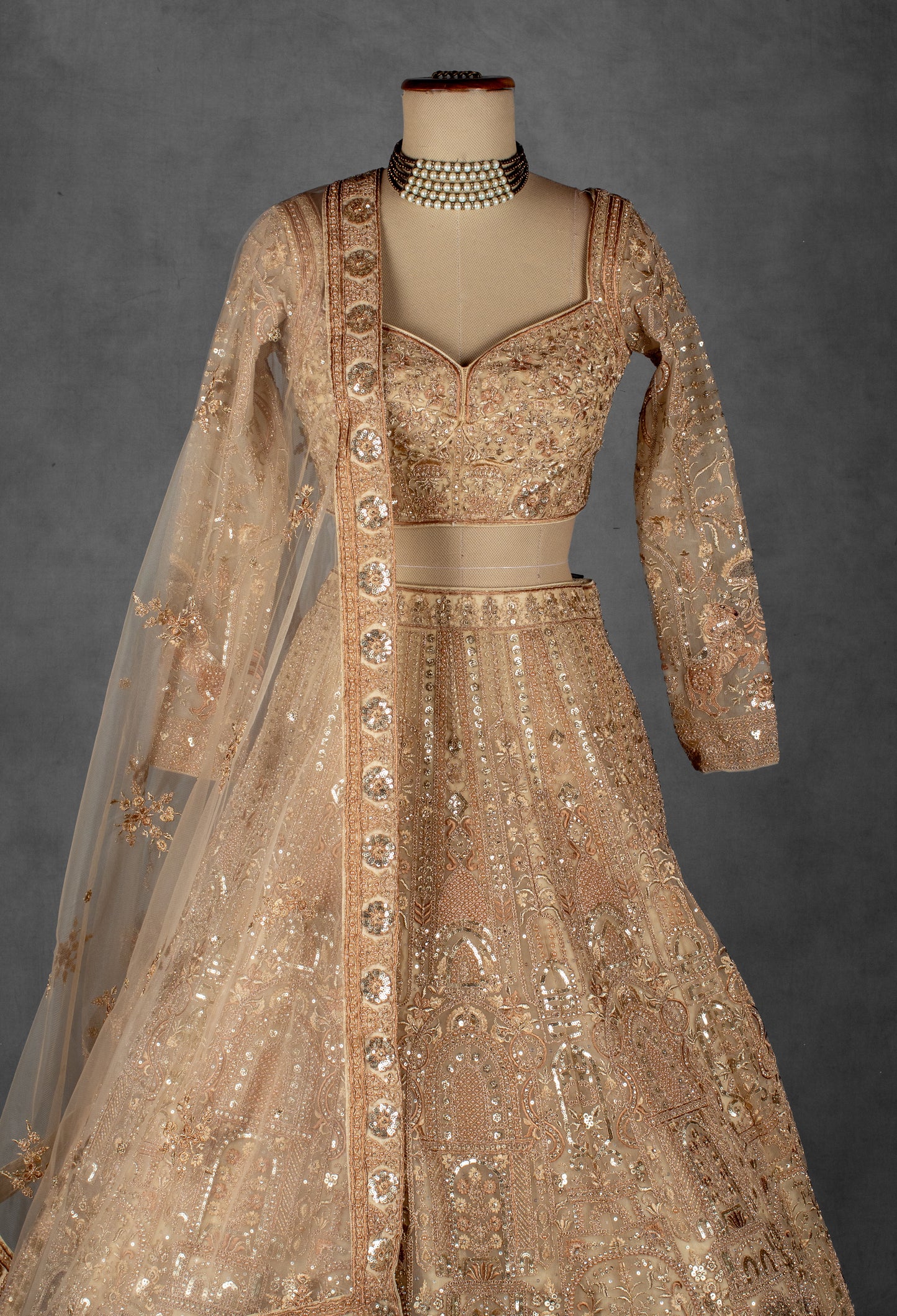 Champagne Gold Zardozi Embroidered Bridal Lehenga Set with Net Dupatta