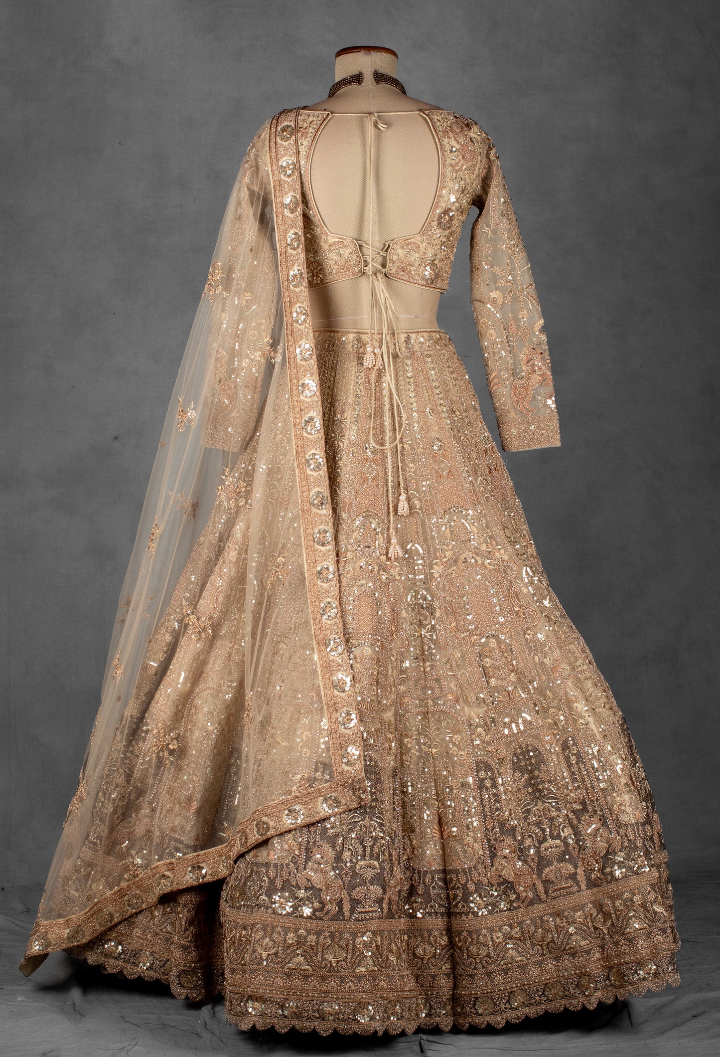 Champagne Gold Zardozi Embroidered Bridal Lehenga Set with Net Dupatta