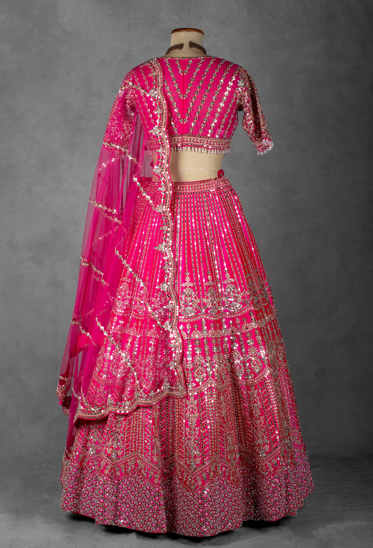 Fuchsia Pink Mirror & Sequin Embroidered Crop Top Lehenga Set with Net Dupatta