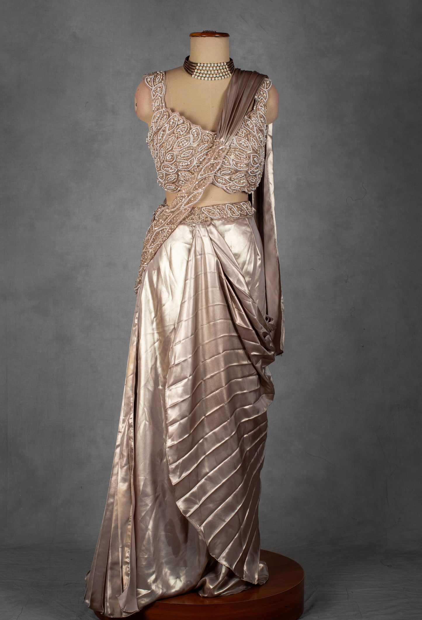 Champagne Satin Drape Saree with Intricately Embellished Blouse