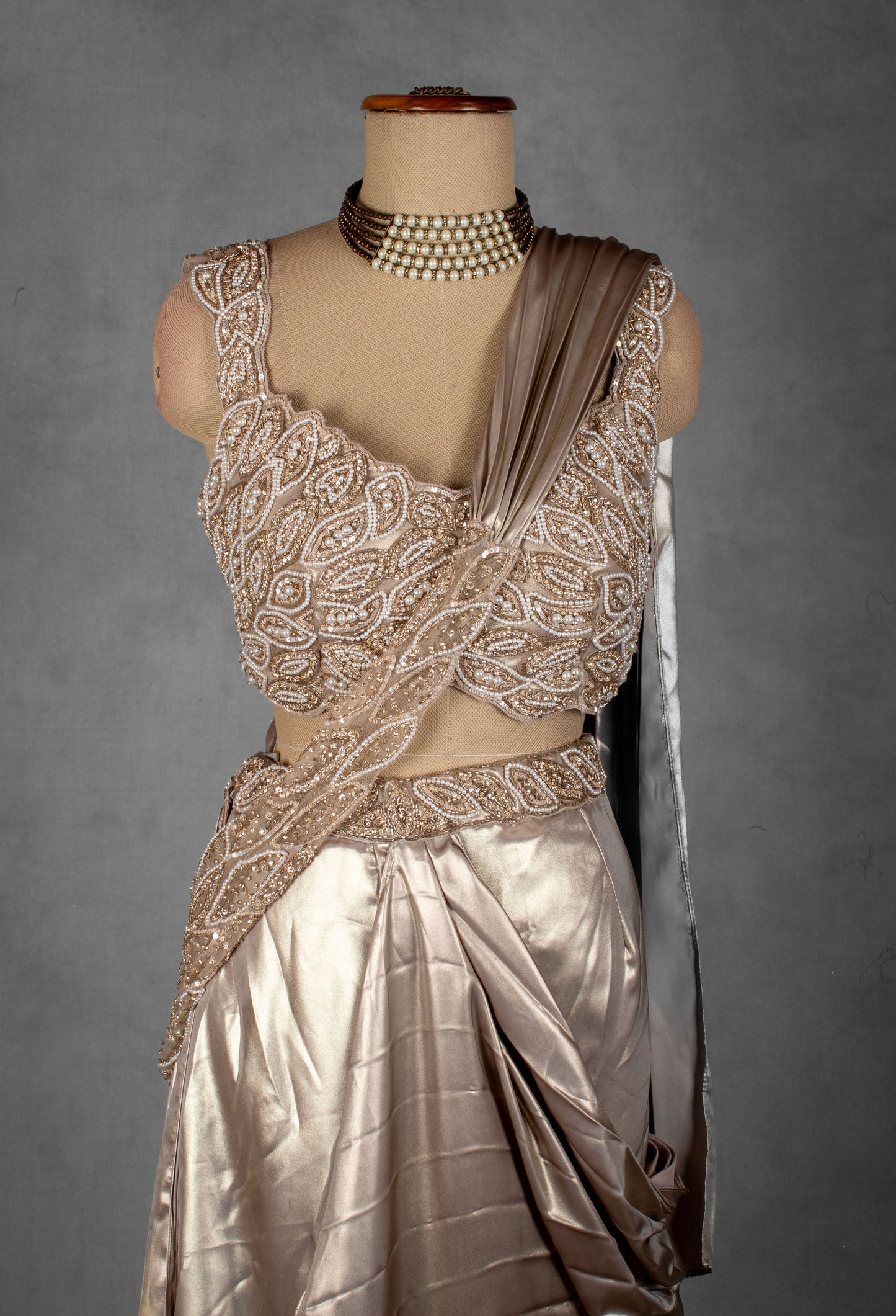 Champagne Satin Drape Saree with Intricately Embellished Blouse