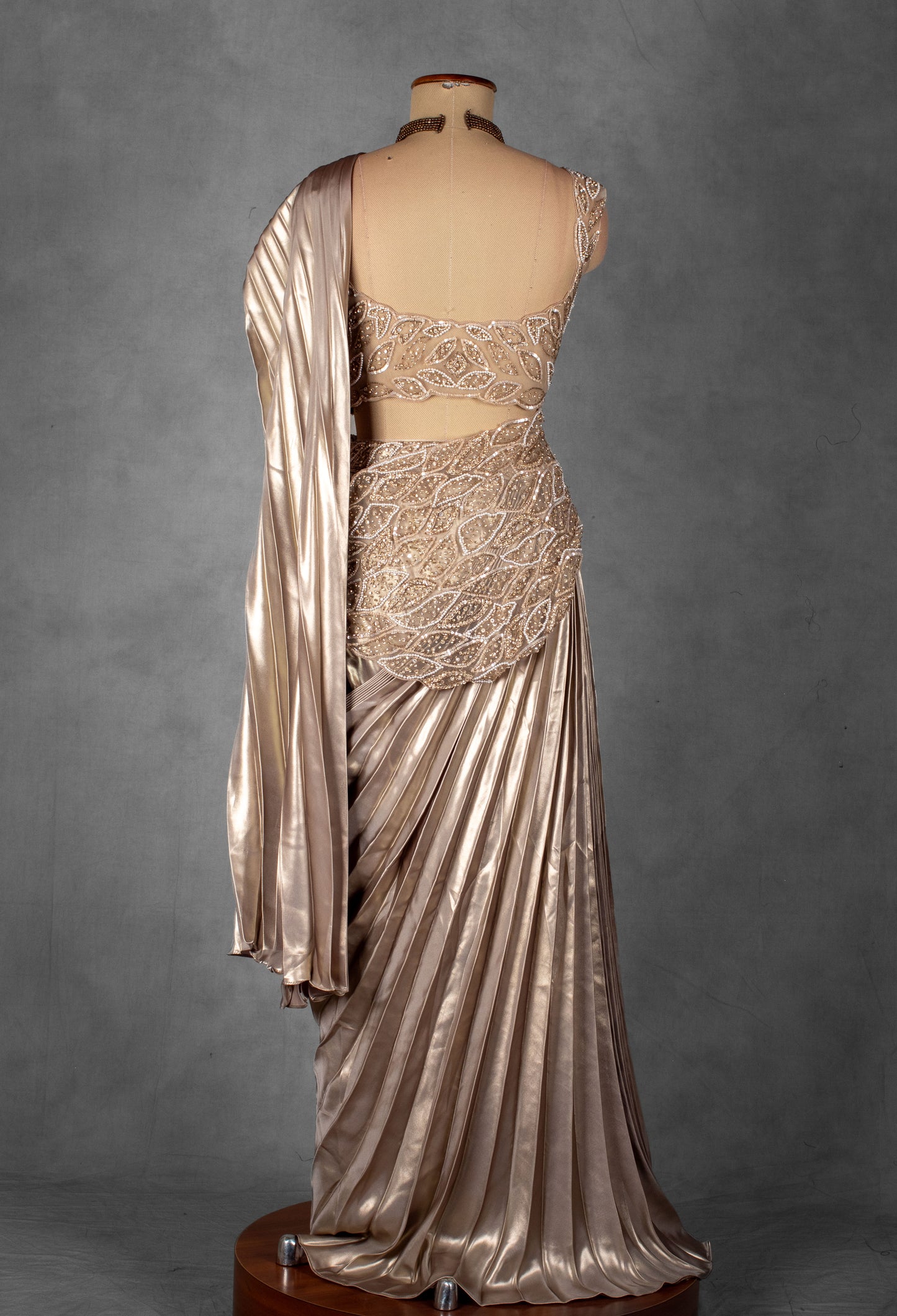 Champagne Satin Drape Saree with Intricately Embellished Blouse